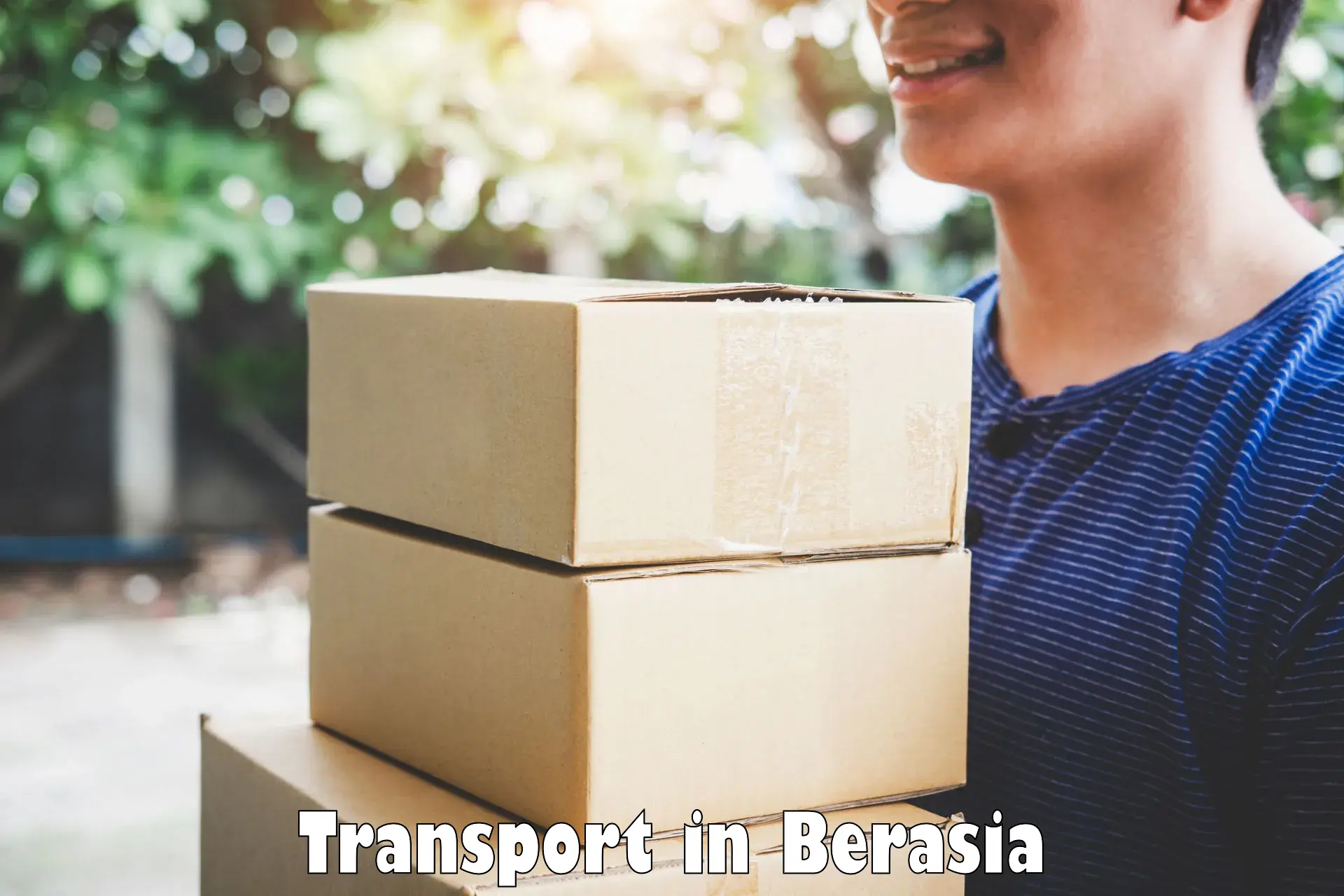 Two wheeler transport services in Berasia