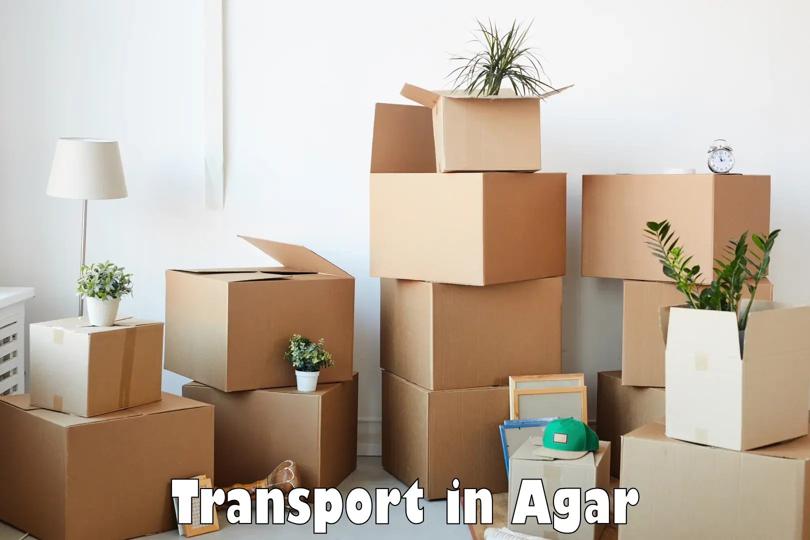 Two wheeler transport services in Agar